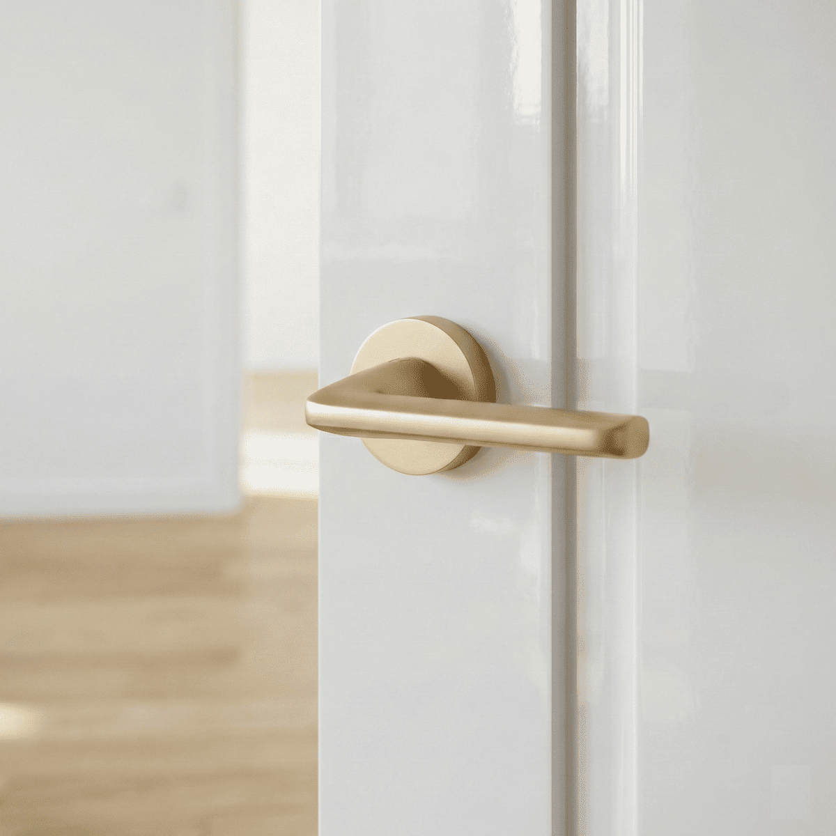 Deurklink op ronde rozet van mat goudkleurig aluminium RS-310